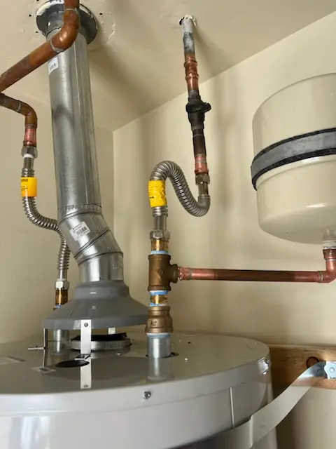 Water heater installation and plumbing repair in Garden Hills